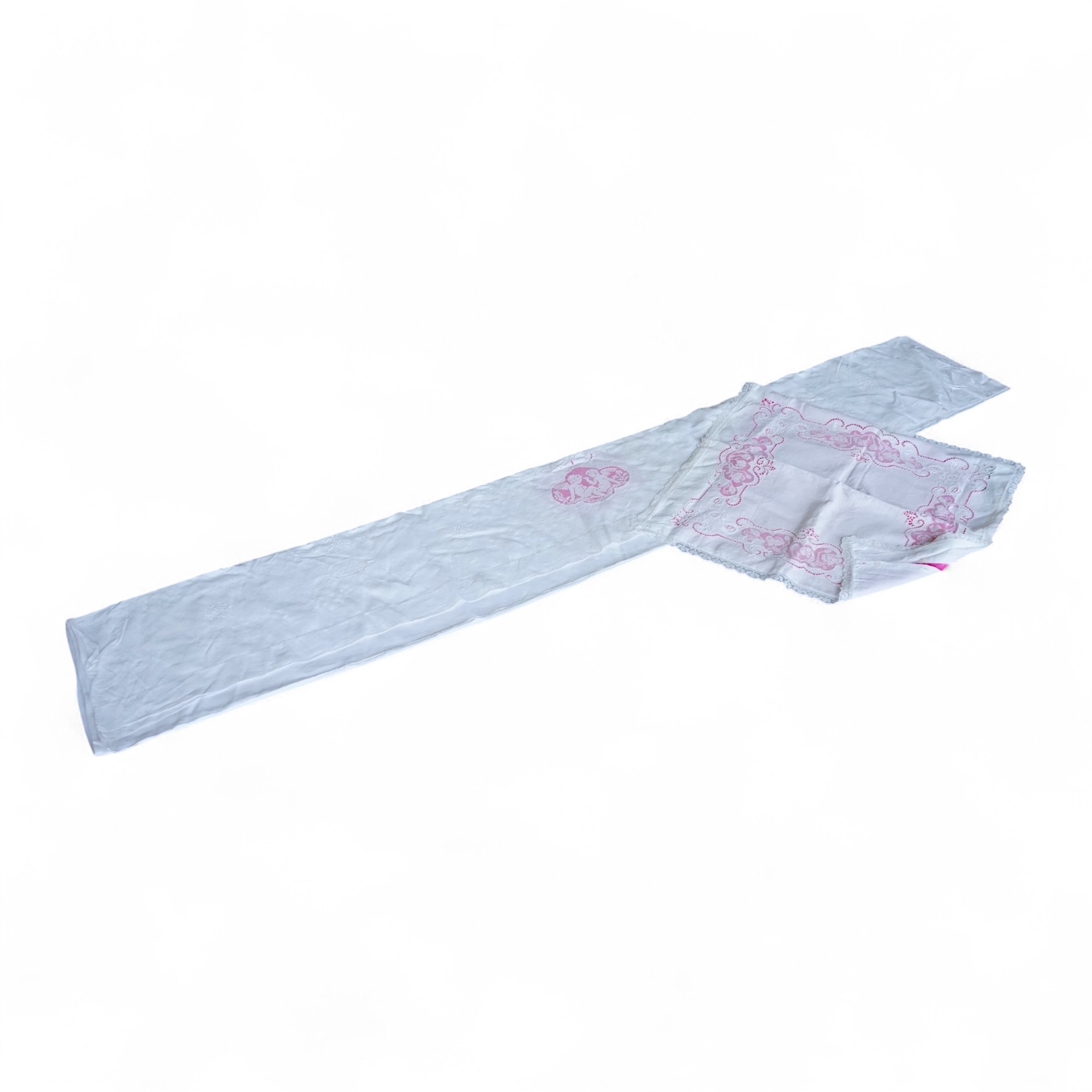 A late 19th century early 20th century finely woven, hand worked linen sheet 6’8”wide, together with a near matching large square pillowcase. Both items worked in Embroidery Anglaise, button holed and inset and trimmed w